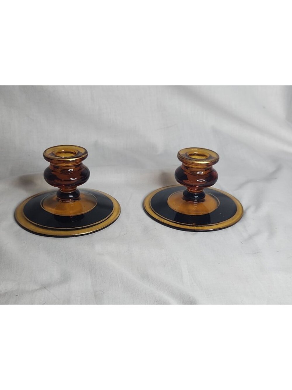 Pair Of Vintage Fostoria "Ships Silver Overlay Amber" glass candlesticks